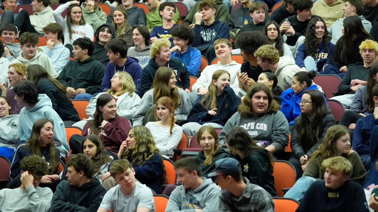 Students discuss ways to prevent school shootings during a presentation of Sandy Hook Promise's "Say Something" program at Hanover High School, March 25, in Hanover, Mass.