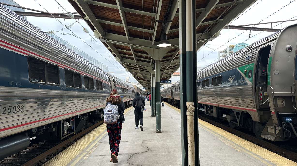 People walk through Union Station on March 27, in Washington. Saturday's arrest won't be the last incident unless Amtrak and other companies find a way to address passenger screening and security at their stations, officials say.