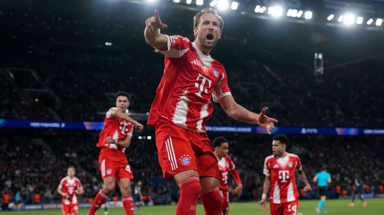 Bayern's Harry Kane celebrates after scoring a penalty, the opening goal of his team during the Champions League semifinal first leg soccer match between Paris Saint-Germain and Bayern Munich in Paris, Tuesday, April 28, 2026.