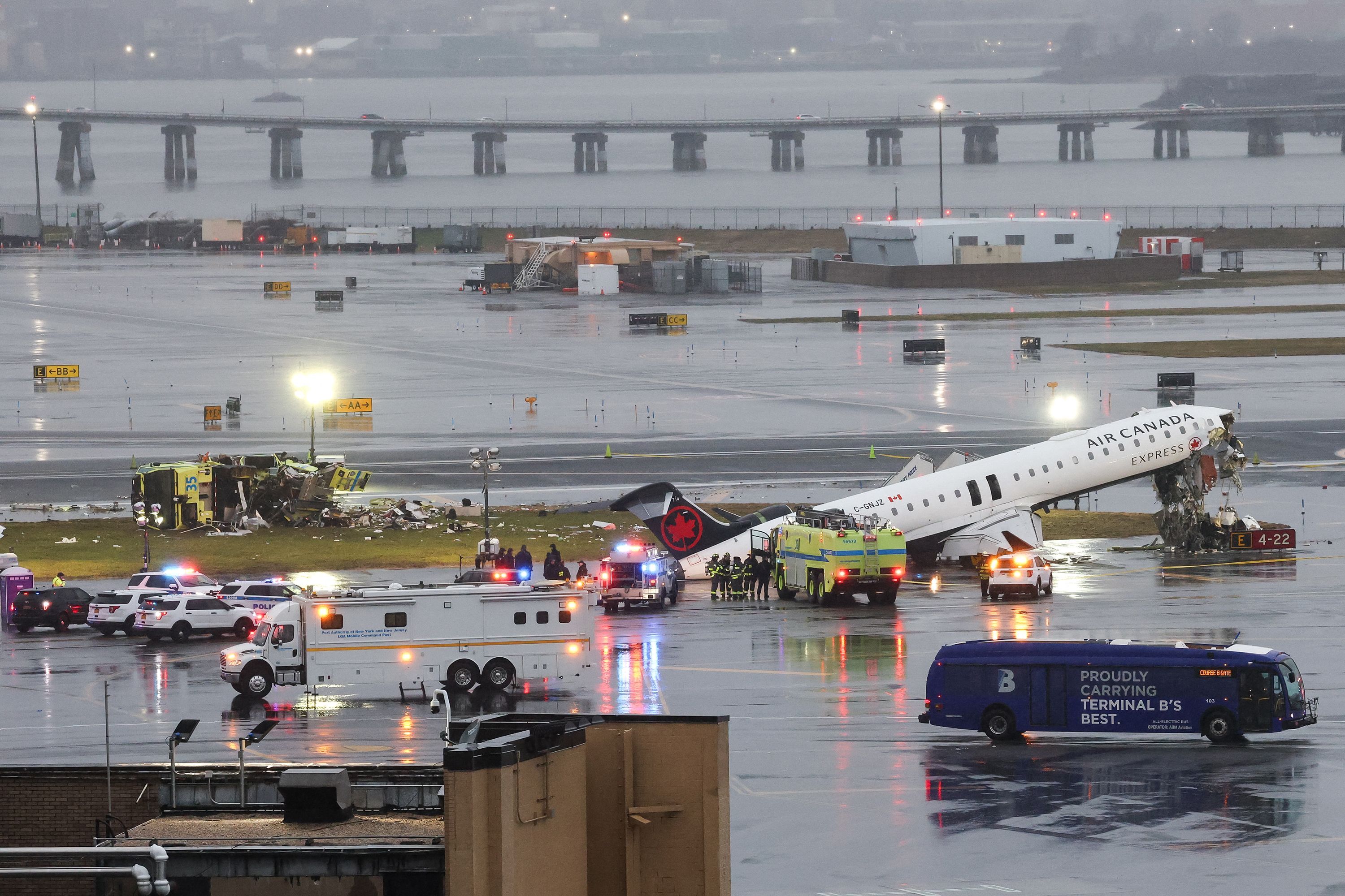 2 air traffic controllers left work early the night of crash at LaGuardia, source says