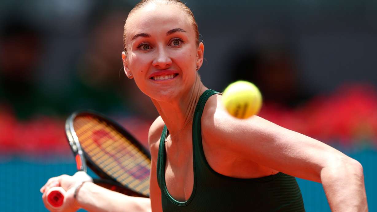 Anastasia Potapova of Russia returns the ball to Karolina Pliskova of the Czech Republic during the Madrid Open tennis tournament in Madrid, Wednesday, April 29, 2026.