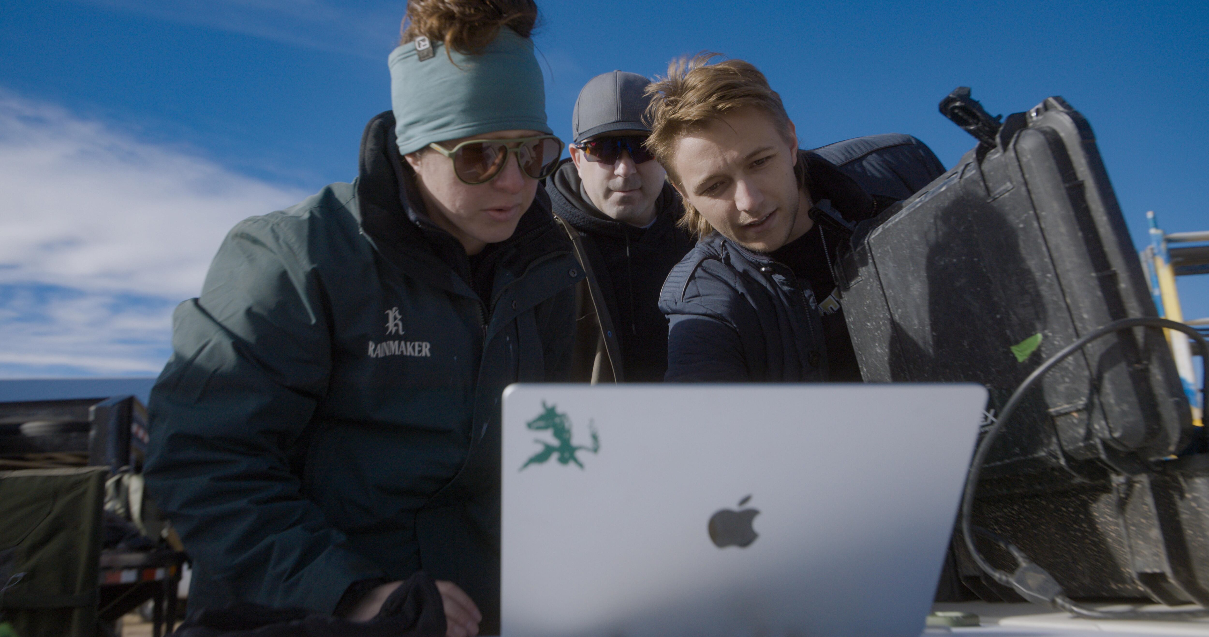 Augustus Doricko, CEO and founder of Rainmaker, works with team members as they review drone telemetry data during a research operation outside Kamas. The company, like many other cloud-seeding companies, has been up against the challenge of validation.