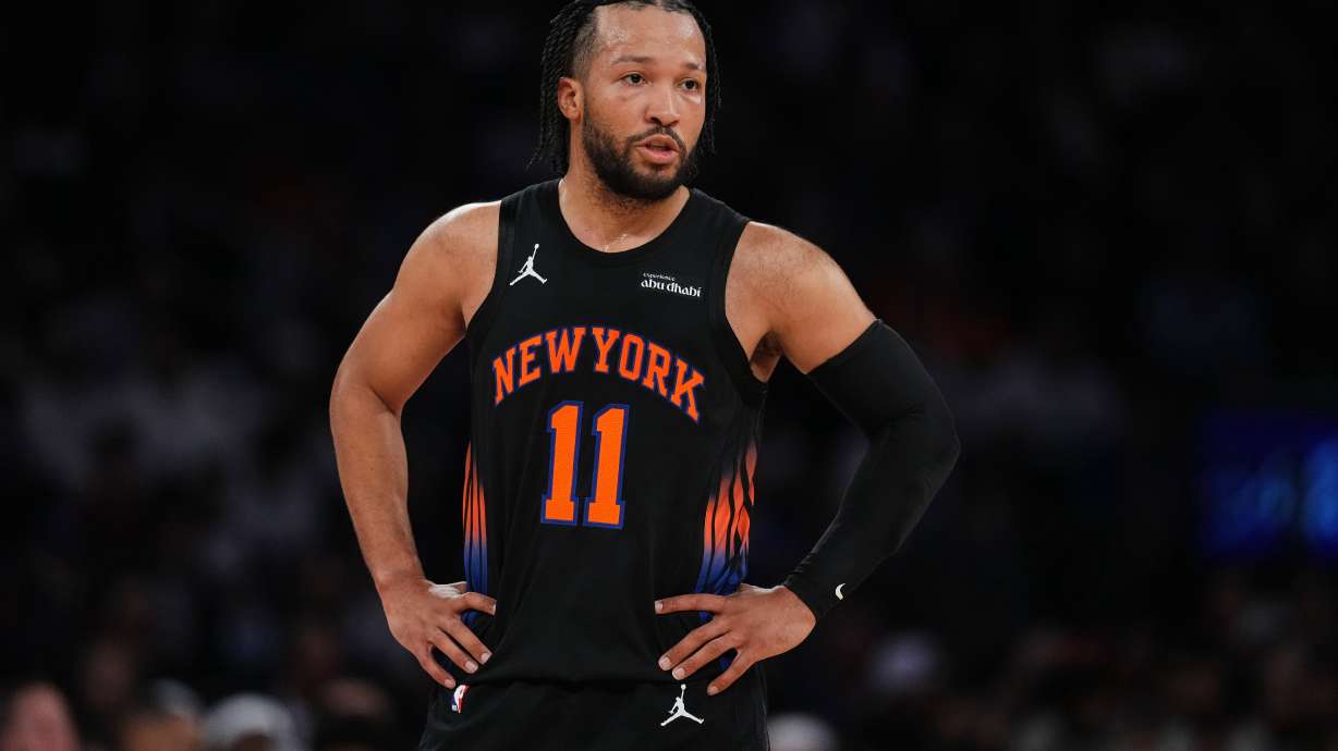 New York Knicks' Jalen Brunson (11) talks to a teammate during the first half in Game 5 of a first-round NBA playoffs basketball series against the Atlanta Hawks, Tuesday, April 28, 2026, in New York.