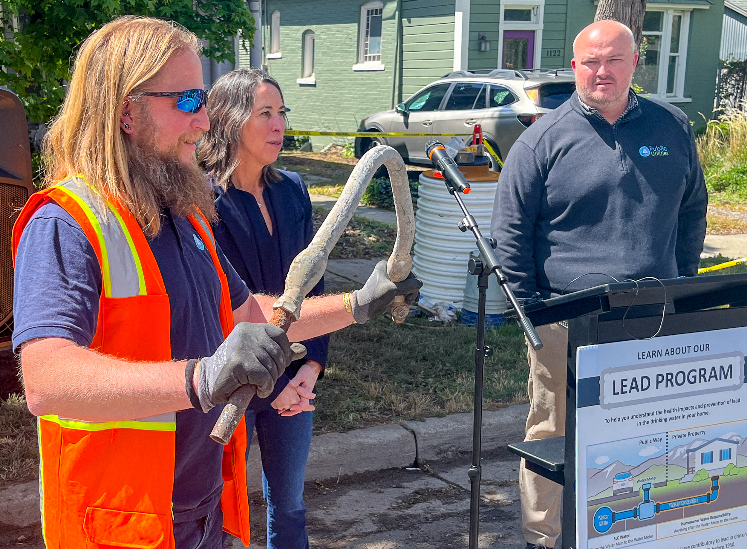A Salt Lake City Department of Public Utilities employee demonstrates the strength and flexibility of a line service line pipe on Wednesday. The department is looking to replace all remaining lead lines within its system.