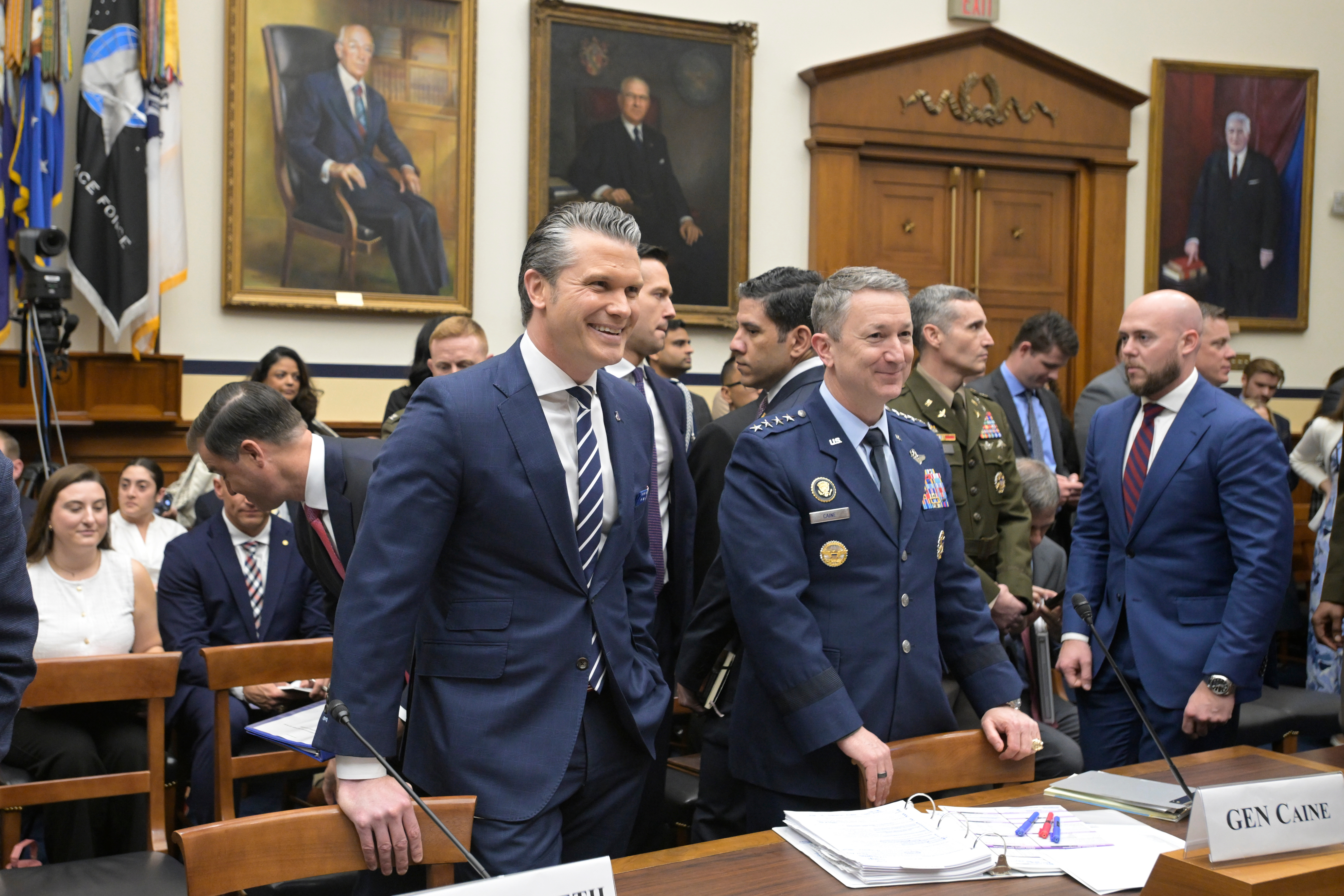 Secretary of Defense Pete Hegseth and Gen. Dan Caine, chairman of the Joint Chiefs of Staff, appear before a House Committee on Armed Services business meeting on Capitol Hill, Wednesday, in Washington.