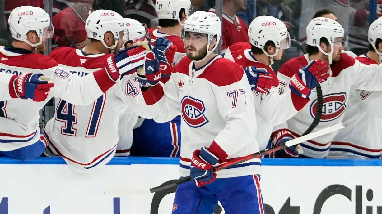 Montréal Canadiens center Kirby Dach (77) celebrates with the bench after his goal against the Tampa Bay Lightning during the second period in Game 5 of an NHL hockey Stanley Cup first-round playoff series, Wednesday, April 29, 2026, in Tampa, Fla.