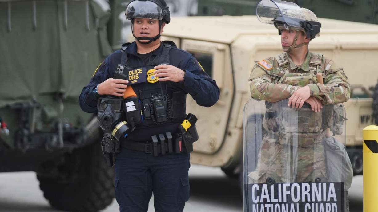 Department of Homeland Security police and California National Guard members on June 12, 2025, in Los Angeles. The House advanced Republicans' multi-billion-dollar budget framework to fund federal immigration enforcement for the next three years.