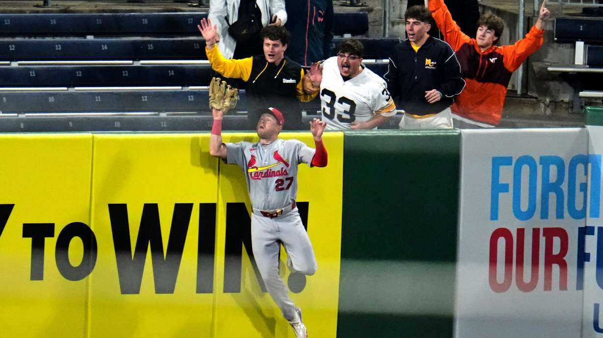 St. Louis Cardinals left fielder Nathan Church (27) leaps to make the catch on a fly ball by Pittsburgh Pirates' Nick Gonzales to end the baseball game in Pittsburgh, Wednesday, April 29, 2026.