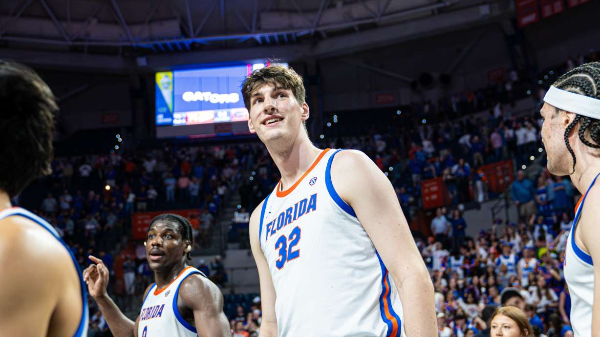 FILE - Florida center Olivier Rioux (32) smiles following their win over Mississippi State during the second half of an NCAA college basketball game on March 3, 2026, in Gainesville, Fla.