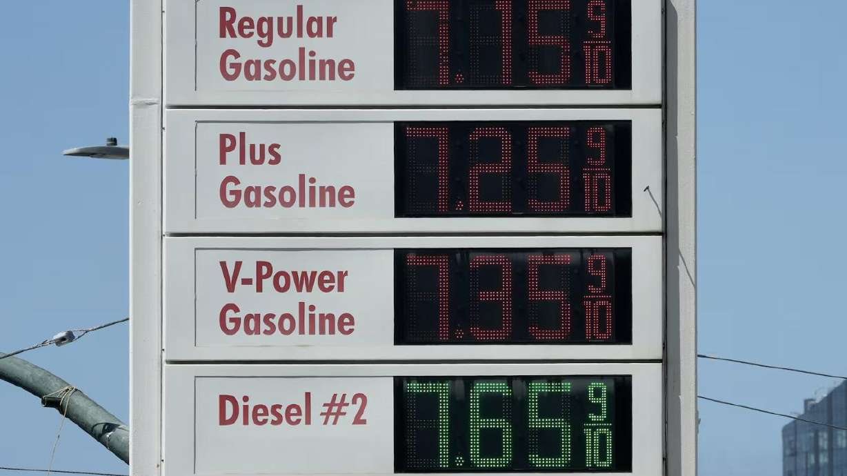 Prices are displayed on a gasoline board at a gas station, Wednesday, in San Francisco. Utahns aren’t the only ones paying more for a gallon of gas — many states in the West are struggling with steeper prices.