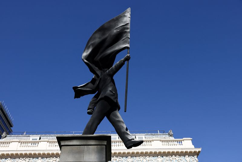 London hails new Banksy statue of man blinded by flag