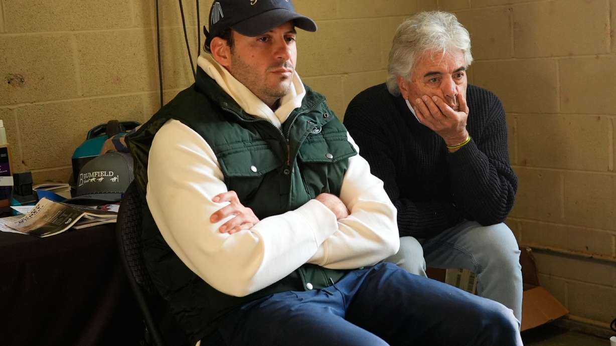 Trainers Gustavo Delgado Sr. and his son Gustavo Delgado Jr. watch a video of workouts after taking their horse, Kentucky Derby entrant The Puma, for a workout at Churchill Downs Thursday, April 30, 2026, in Louisville, Ky.