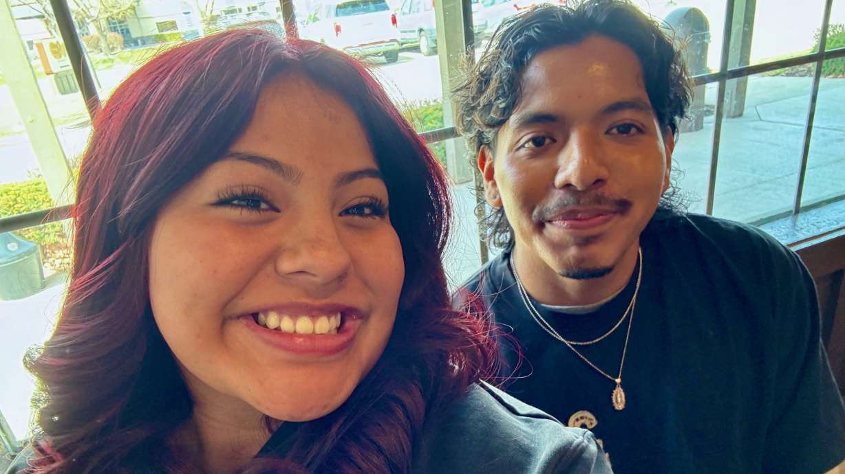 Lisandro Pantaleon Pacheco, right, who came to the United States from Mexico as a 1-year-old, was detained Wednesday by immigration officials. He's pictured with his girlfriend Britney Xiques.
