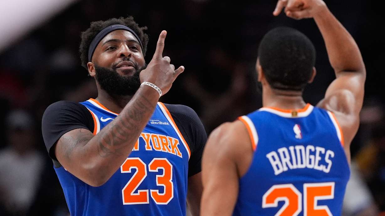 New York Knicks center Mitchell Robinson (23) celebrates after scoring in the first half during Game 6 in a first-round NBA basketball playoffs series against the Atlanta Hawks Thursday, April 30, 2026, in Atlanta.