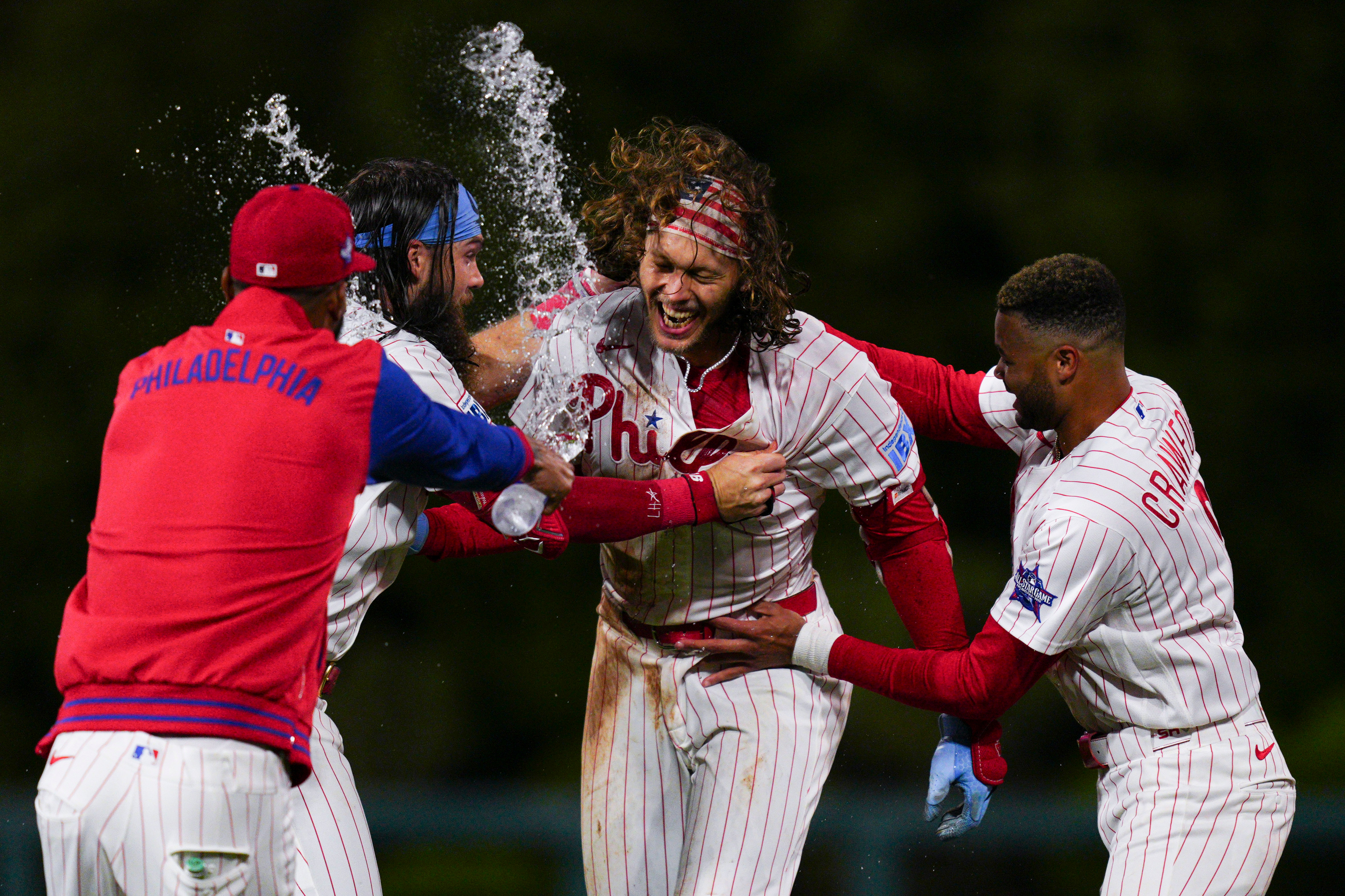Philadelphia Phillies' Alec Bohm, secind from right, celebrates with teammates after his walkoff sacrifice fly during the 10th inning of the second baseball game of a doubleheader against the San Francisco Giants, Thursday, April 30, 2026, in Philadelphia.