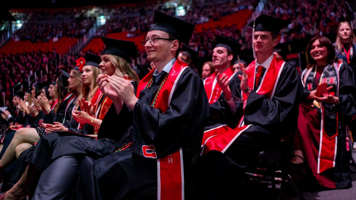 Graduates clap during the University of Utah class of 2026 commencement ceremony at the Jon M. Huntsman Center in Salt Lake City on Thursday.