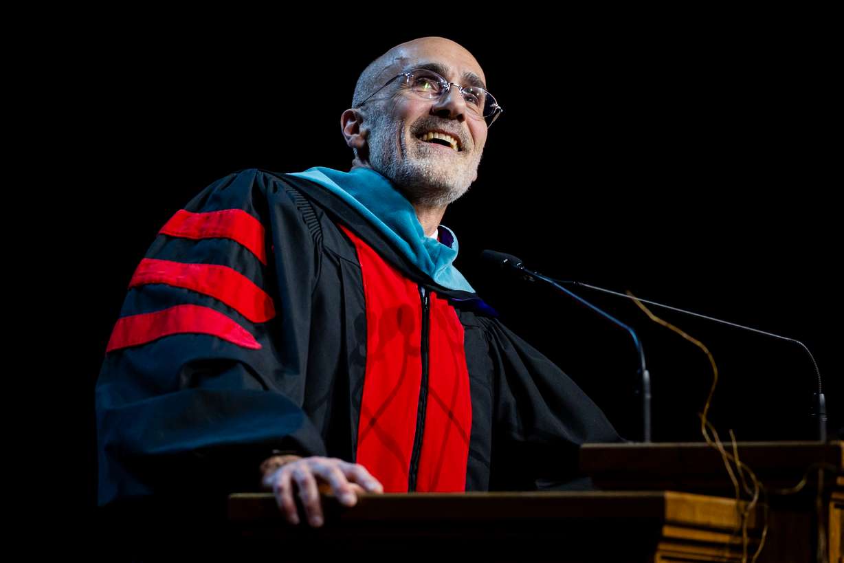 Arthur C. Brooks delivers the commencement address during the University of Utah's commencement ceremony at the Jon M. Huntsman Center in Salt Lake City on Thursday. Brooks said he was "inspired" after his speech changed at the eleventh hour after listening to Gerald Parrott, the student speaker.