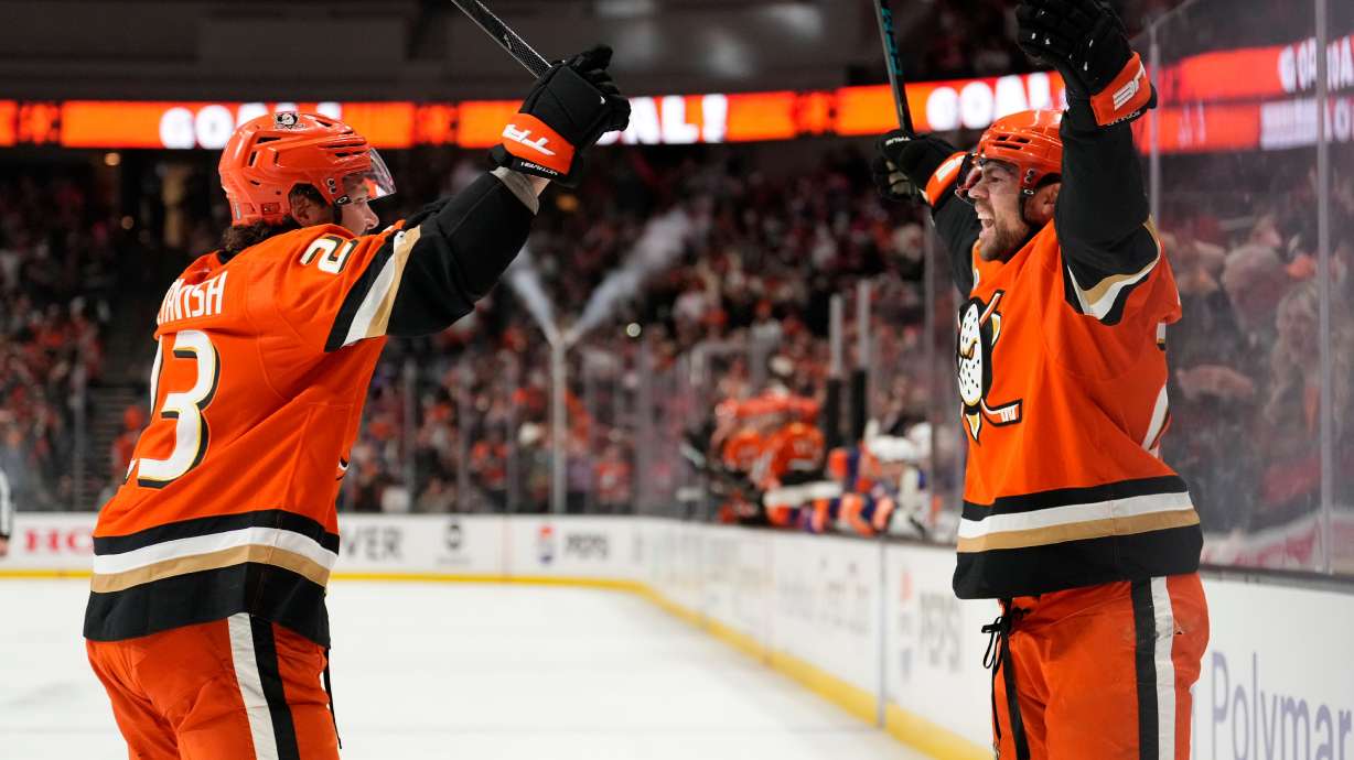 Anaheim Ducks center Ryan Poehling, right, celebrates his goal with center Mason McTavish during the first period of Game 6 in the first round of the NHL hockey Stanley Cup playoffs series against the Edmonton Oilers, Thursday, April 30, 2026, in Anaheim, Calif.