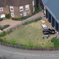 Woman who drove into a tea party outside a London school charged over death of 2 girls