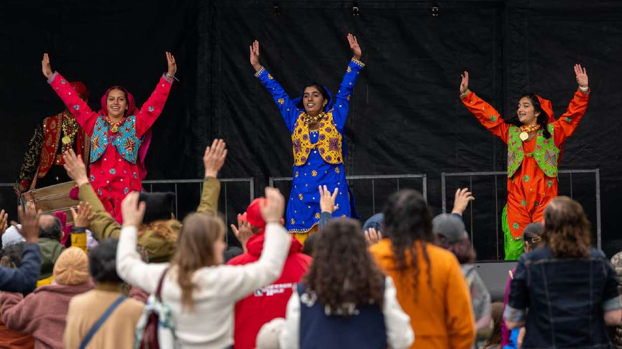 Dancers entertain audience members at the Living Traditions Festival at Washington Square in Salt Lake City on May 18, 2025.