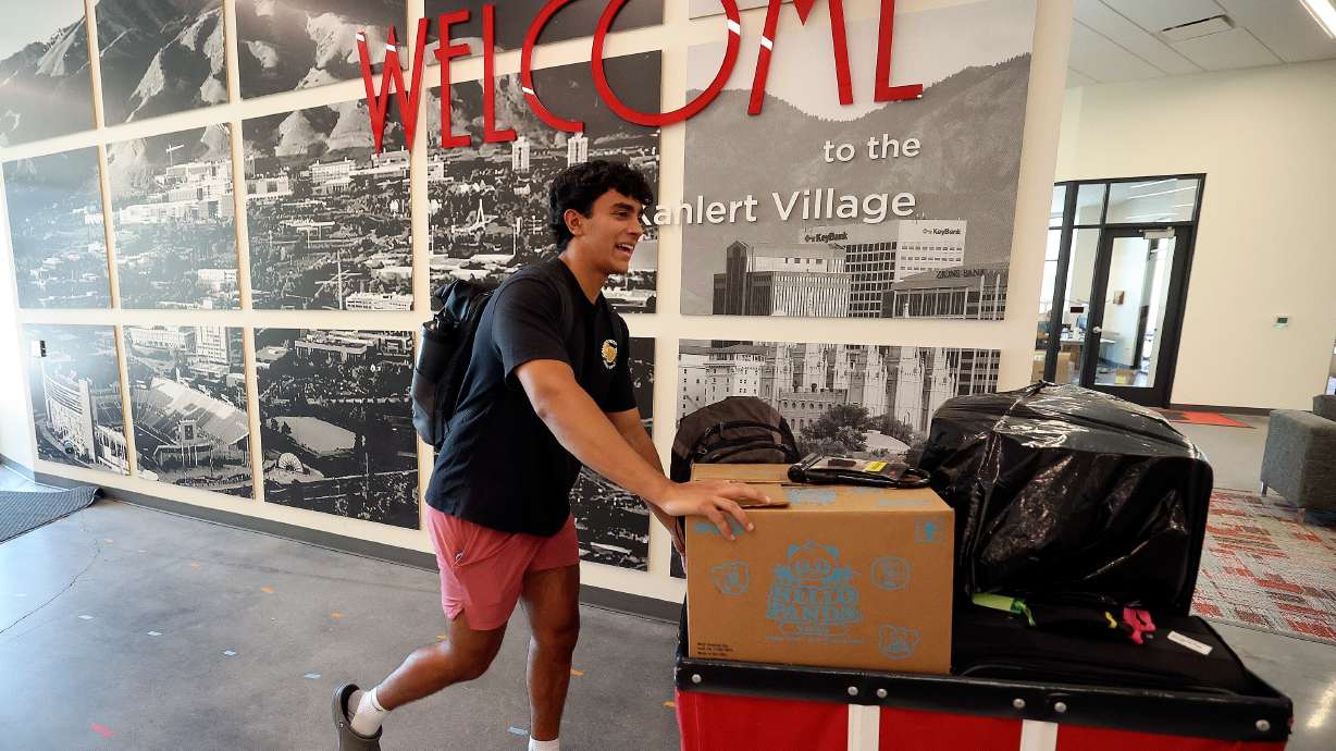 Sam Moten moves into his dorm at the University of Utah in Salt Lake City on Aug. 15, 2023. A recent national survey focused on how students feel about their money situation at a moment when even a trip to the grocery store triggers anxiety.