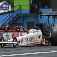 Shawn Langdon breaks the NHRA speed record by reaching 345 mph in his Top Fuel dragster
