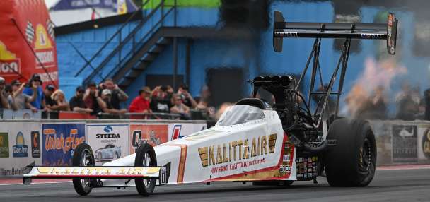 Shawn Langdon breaks the NHRA speed record by reaching 345 mph in his Top Fuel dragster