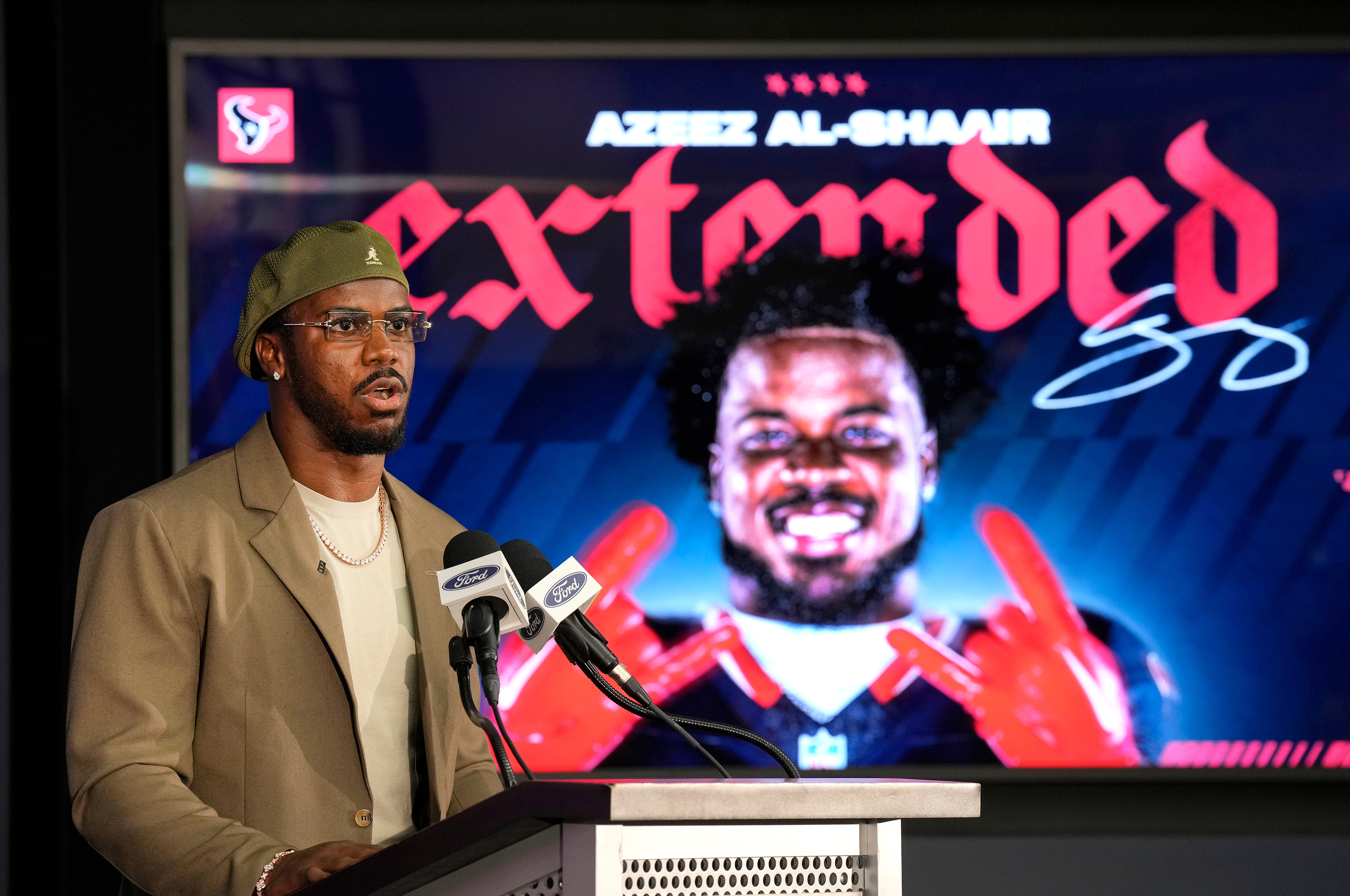 Houston Texans' Azeez Al-Shaair talks about his contract extension during a press conference at the NFL football team's facility, Friday, May 1, 2026, in Houston.