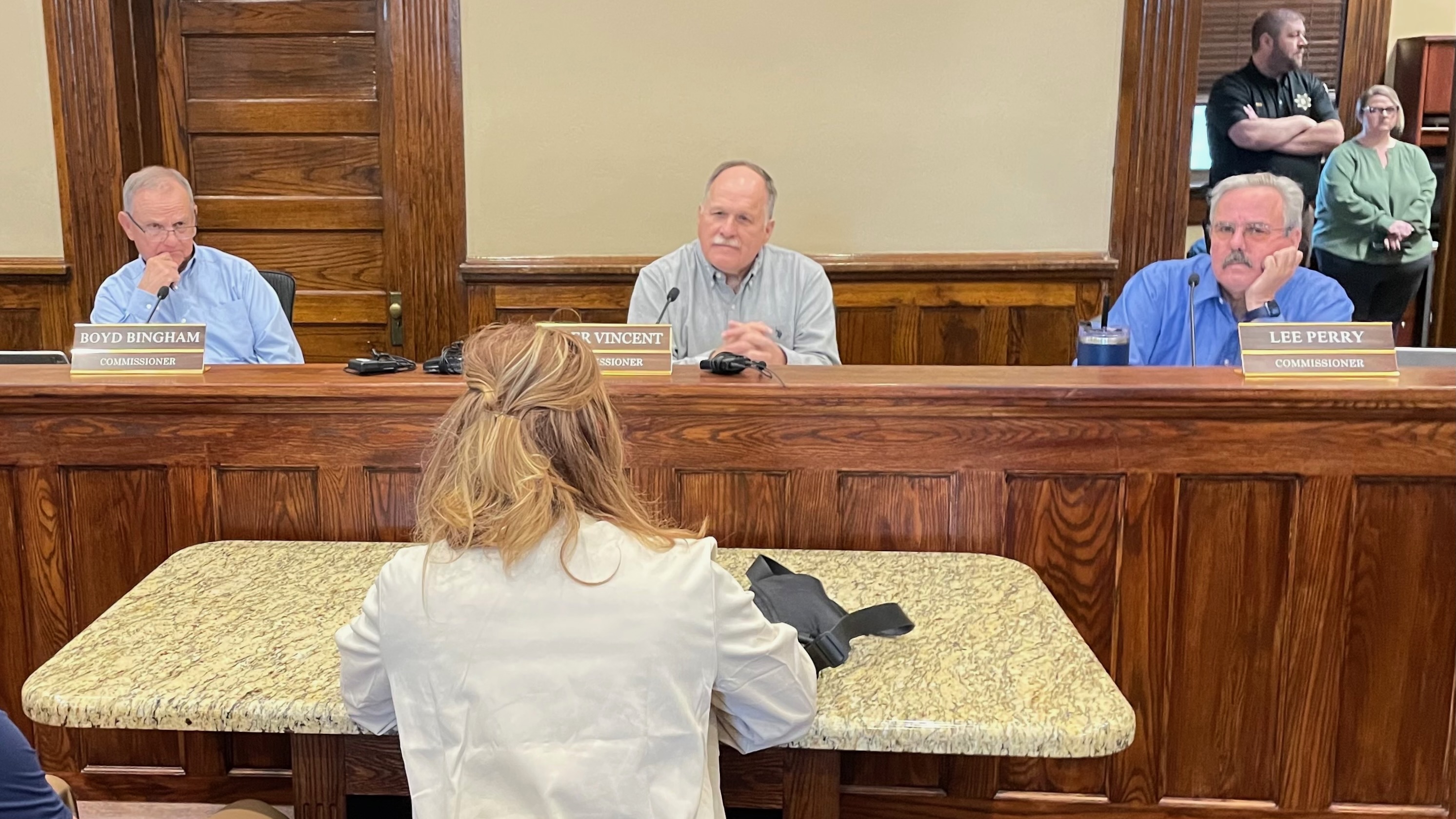 Boyd Bingham, left, Tyler Vincent and Lee Perry, April 27 at the Box Elder County Courthouse in Brigham City. Box Elder County commissioners will consider a controversial data center proposal on Monday.