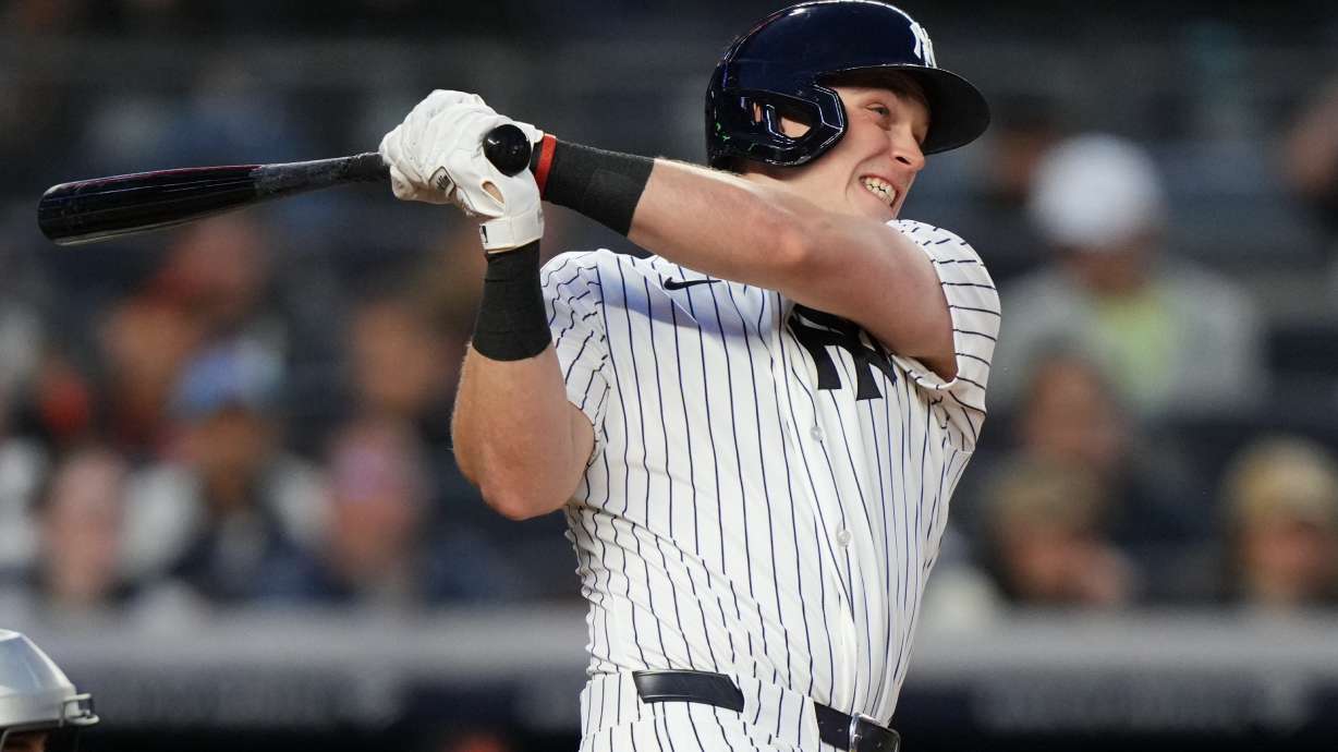 New York Yankees' Ben Rice follows through on a three-run home run during the second inning of a baseball game against the Baltimore Orioles Friday, May 1, 2026, in New York.