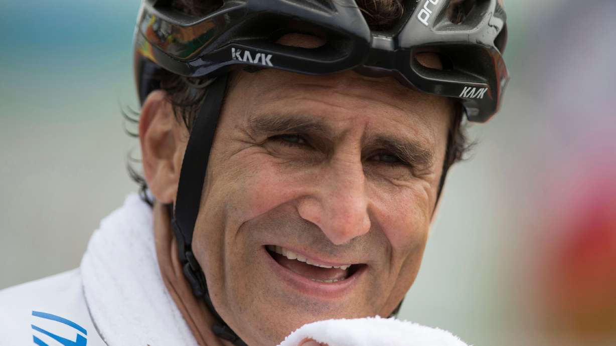 FILE - Alex Zanardi, smiles after winning the silver medal in the men's road race H5, during the 2016 Paralympics Games, in Rio de Janeiro, Brazil, Sept. 15, 2016,