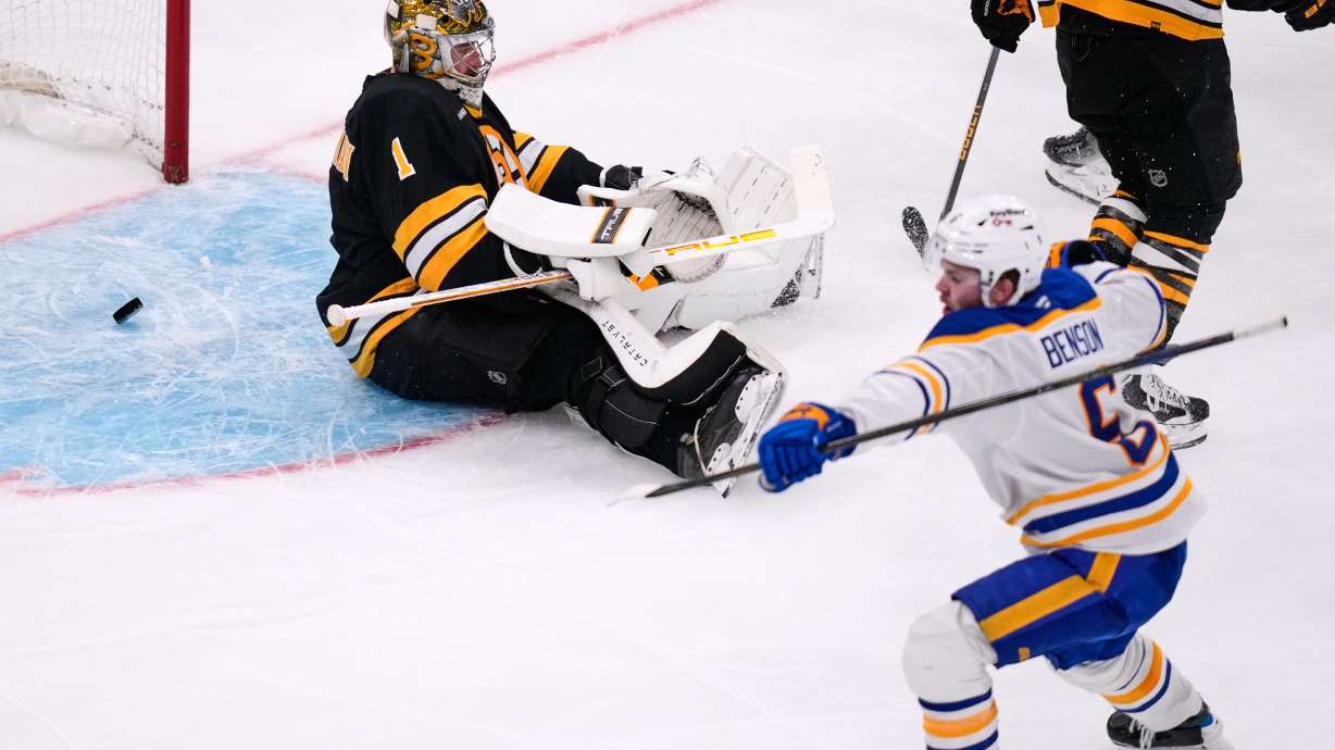 Boston Bruins goaltender Jeremy Swayman (1) sits on the ice after giving up a goal to Buffalo Sabres left wing Zach Benson (6) during the third period in Game 6 of a first-round NHL hockey Stanley Cup playoff series, Friday, May 1, 2026, in Boston.