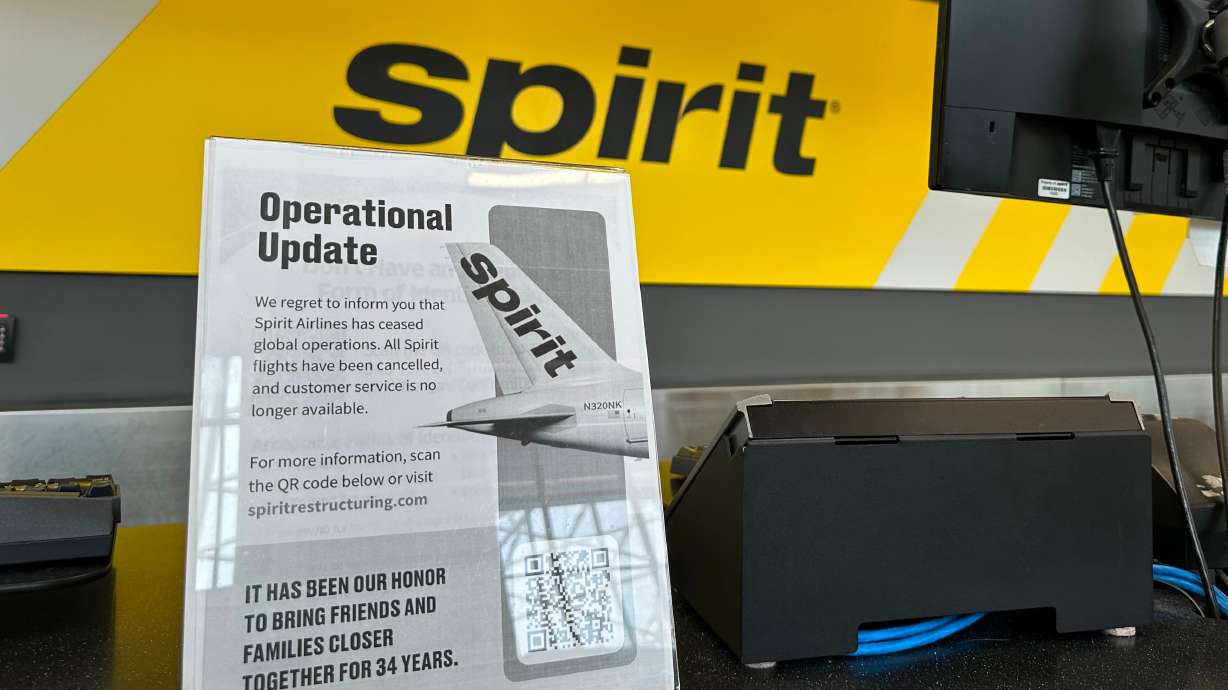 A sign announces Spirit Airlines’ shutdown on Saturday at Hartsfield-Jackson Atlanta International Airport in Atlanta. The company said high oil prices, exacerbated by the Iran war, had made it difficult to stay aloft.