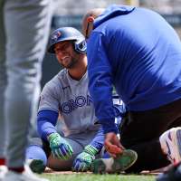 George Springer leaves Blue Jays game after being hit by pitch on left foot, but X-rays are negative