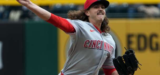 The Reds tie an MLB record by walking 7 straight batters in a 17-7 loss to the Pirates