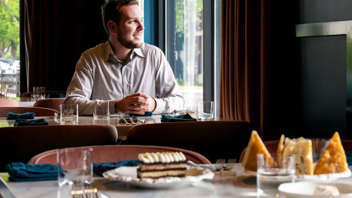 Giro Messeri, co-owner of Mina, a new Sicilian-inspired Italian restaurant, poses for a photo inside the restaurant in Salt Lake City on Wednesday. The restaurant has already garnered over 100 five-star reviews on Google.