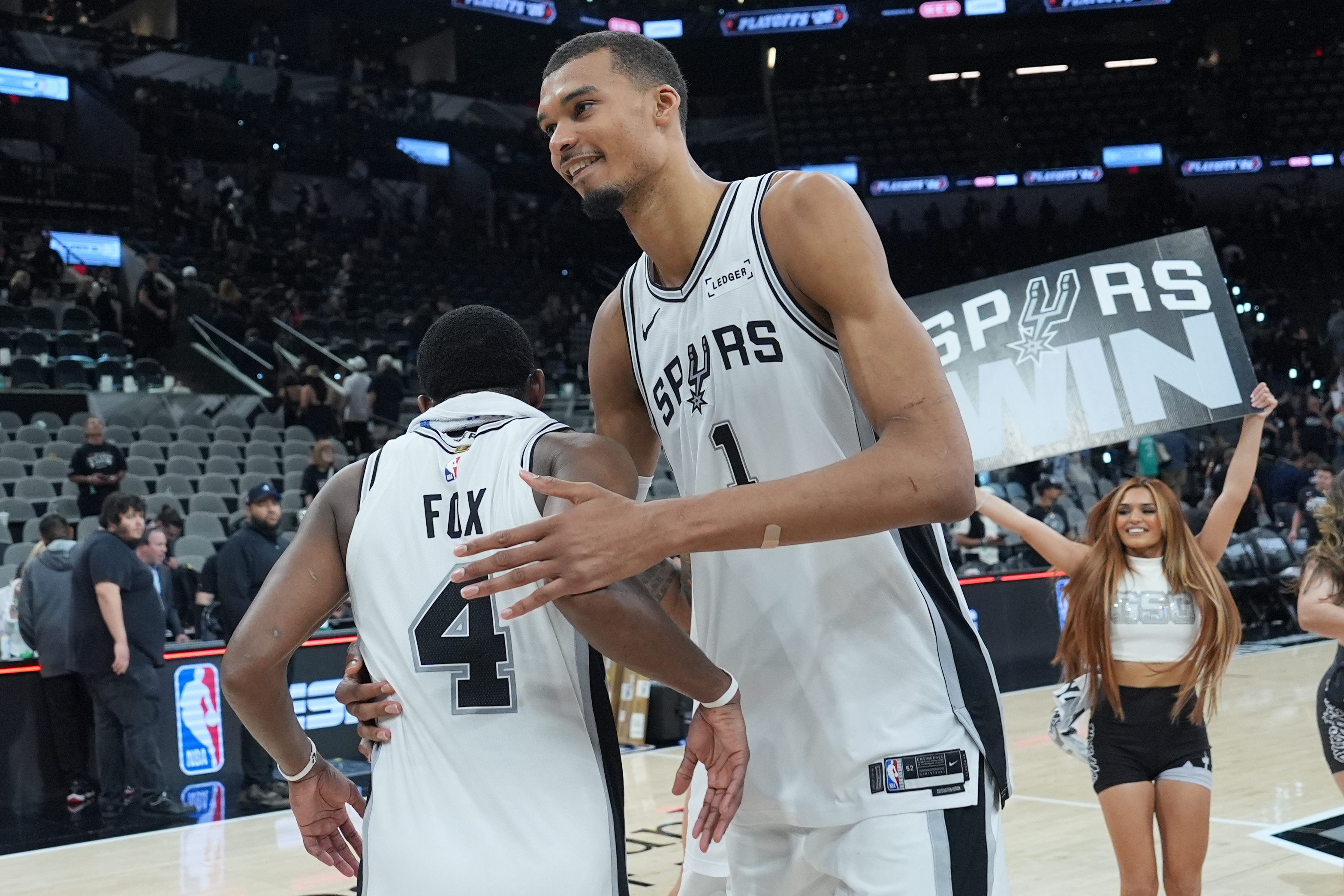 San Antonio Spurs forward/center Victor Wembanyama (1) greets guard De'aaron Fox (4) after Game 5 of a first-round NBA playoffs basketball series against the Portland Trail Blazers in San Antonio, Tuesday, April 28, 2026. 