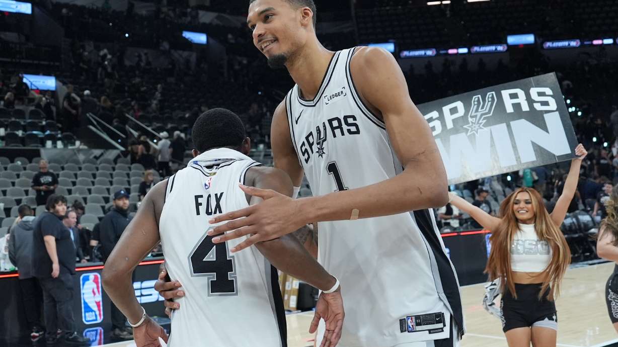 San Antonio Spurs forward/center Victor Wembanyama (1) greets guard De'aaron Fox (4) after Game 5 of a first-round NBA playoffs basketball series against the Portland Trail Blazers in San Antonio, Tuesday, April 28, 2026.