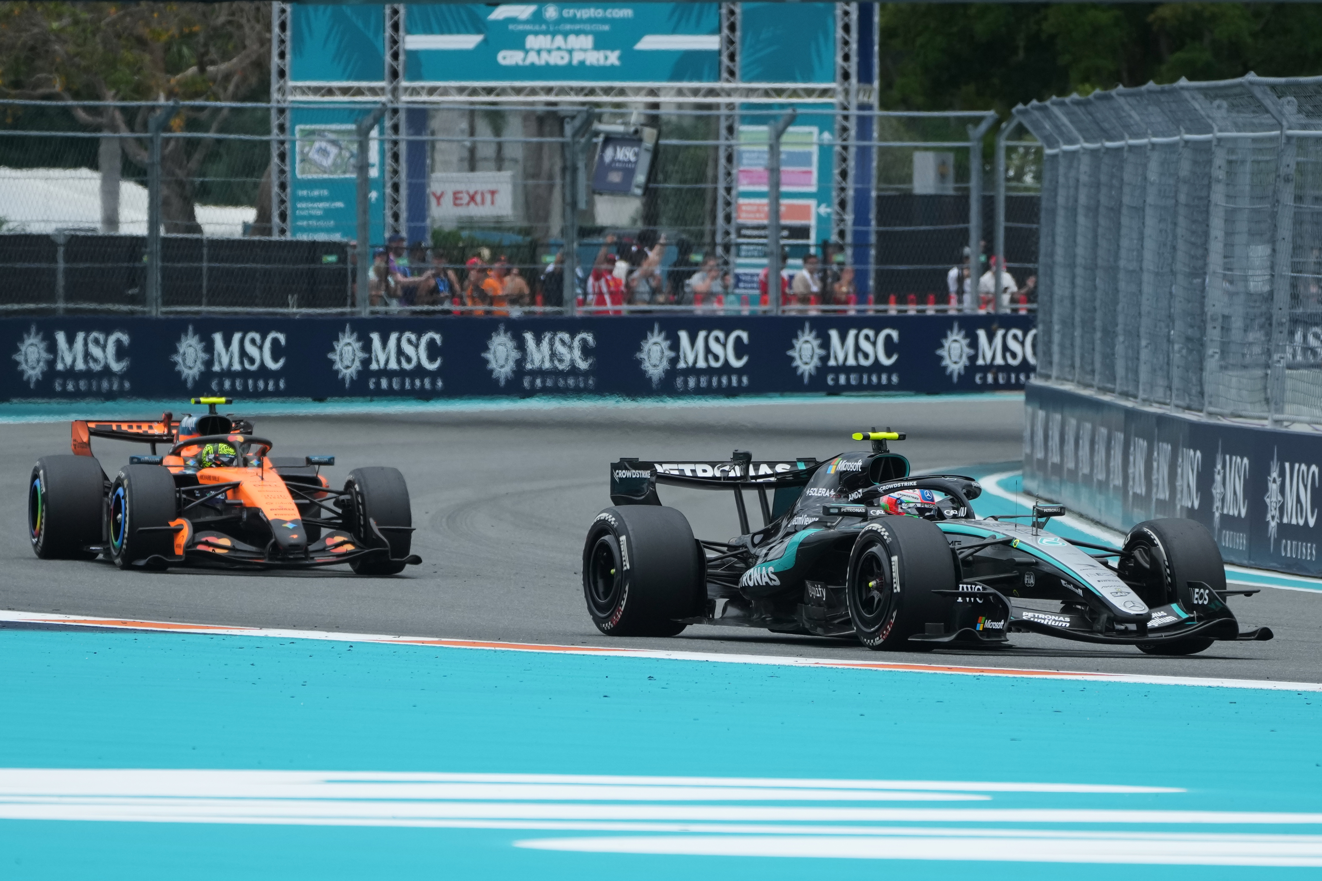 Mercedes driver Kimi Antonelli, right, of Italy and McLaren driver Lando Norris of Britain steer their cars during the Miami Formula One Grand Prix auto race, Sunday, May 3, 2026, in Miami Gardens, Fla. 