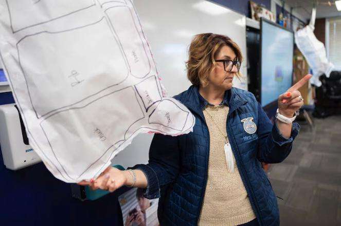 Katie Silcox, North Summit High School animal science teacher, explains a beef primal cuts and retail ID activity to her animal science class as part of the agriculture program in the school's chapter of the National FFA Organization at North Summit High School in Coalville on Wednesday.