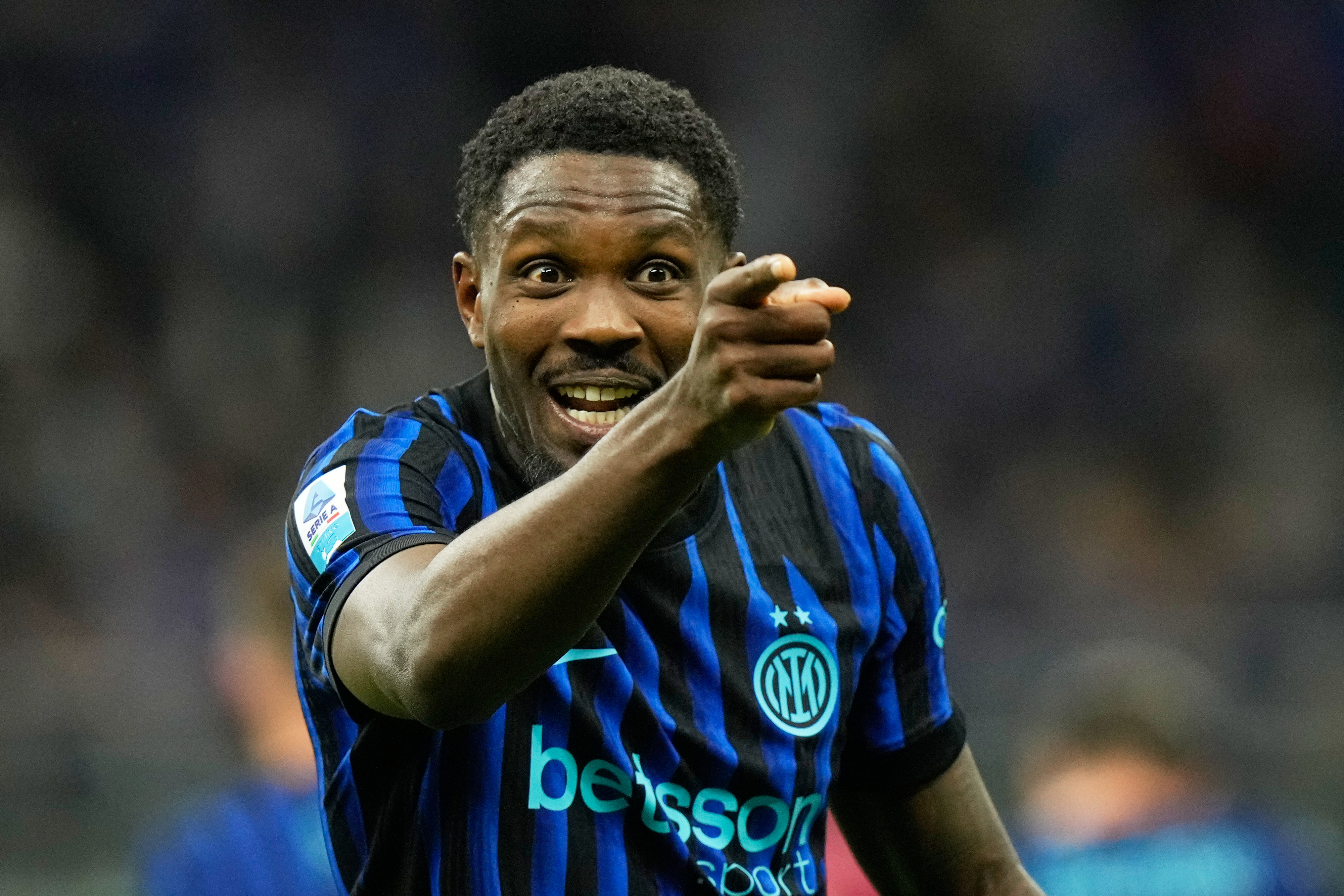 Inter Milan's Marcus Thuram celebrates after scoring his side's opening goal during a Serie A soccer match between Inter Milan and Parma, in Milan, Italy, Sunday, May 3, 2026. 