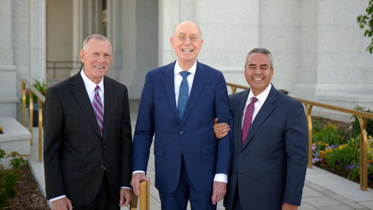 Elder Steven R. Bangerter, President Henry B. Eyring and Elder Jorge T. Becerra pose for a group photo at the Lindon Utah Temple dedication on Saturday.