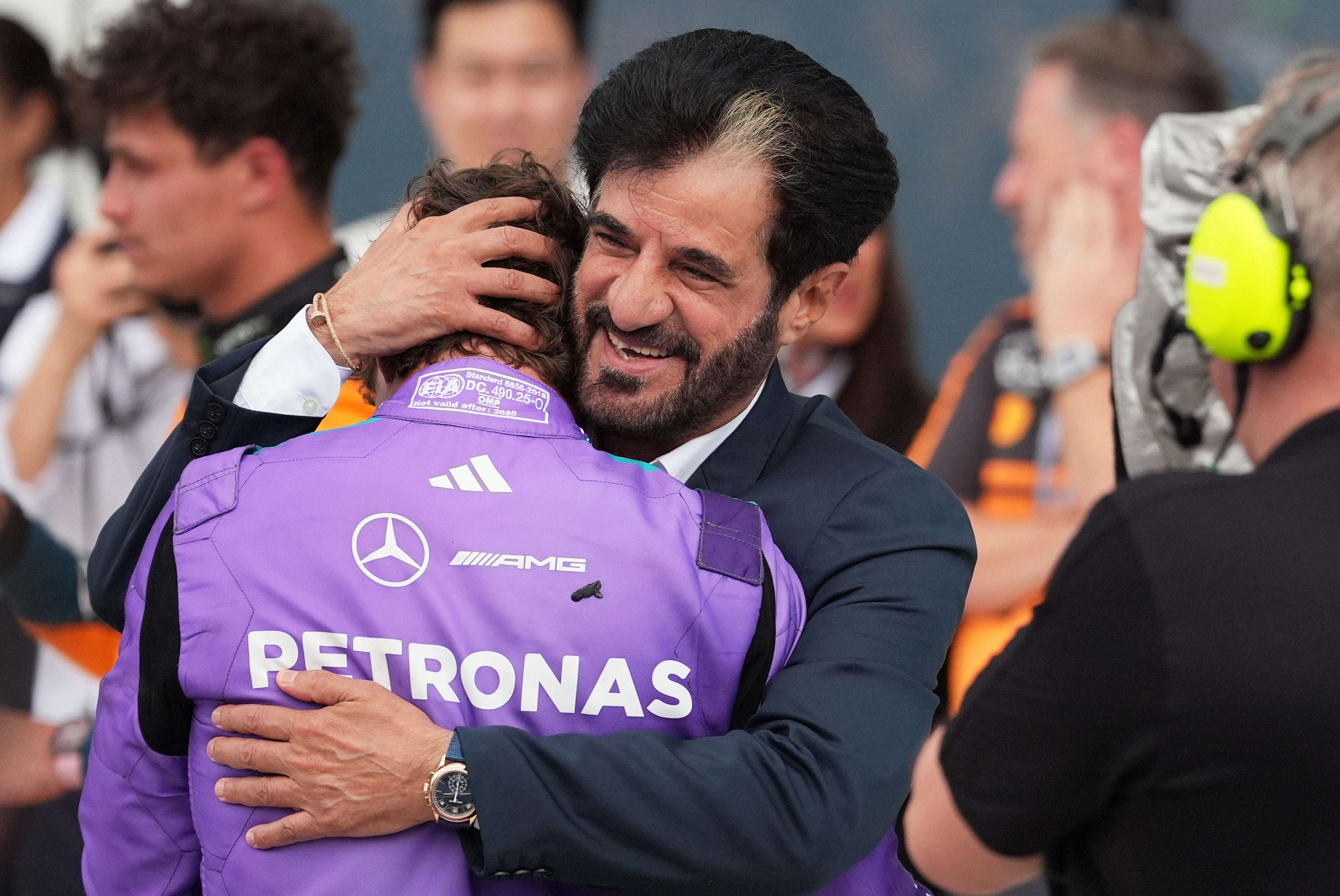 Mohammed Ben Sulayem President of the Federation Internationale de l'Automobile (FIA) hugs Mercedes driver Kimi Antonelli of Italy after Antonelli won the Miami Formula One Grand Prix auto race, Sunday, May 3, 2026, in Miami Gardens, Fla. 