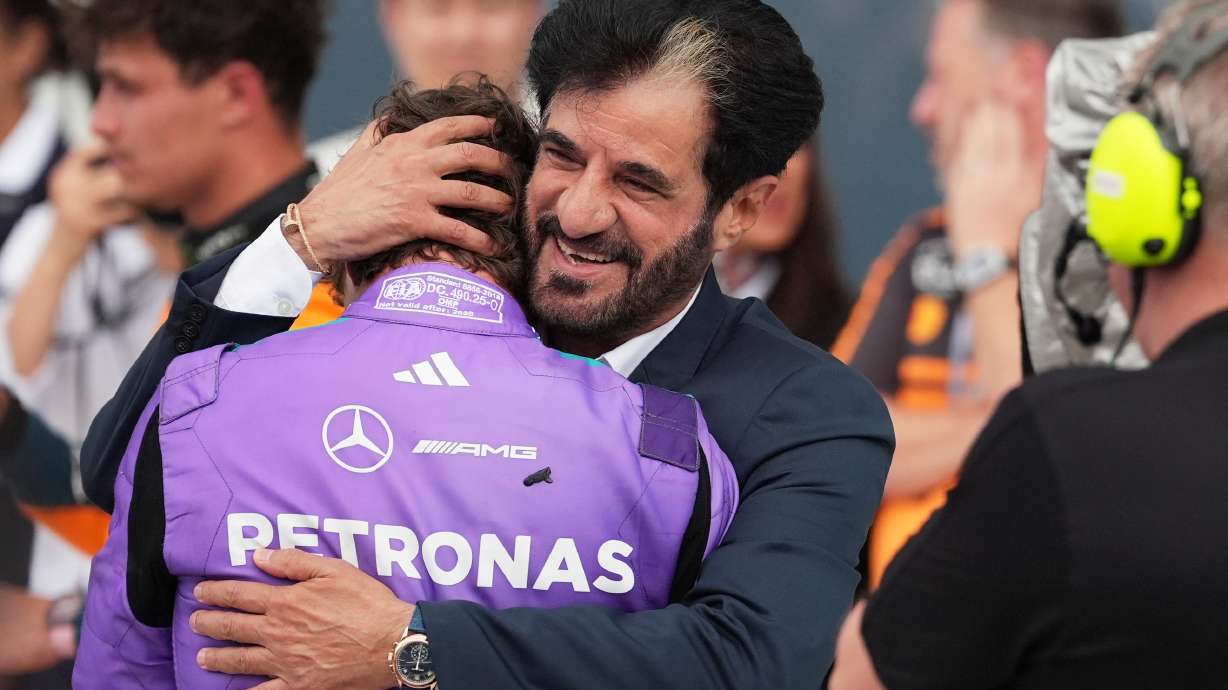 Mohammed Ben Sulayem President of the Federation Internationale de l'Automobile (FIA) hugs Mercedes driver Kimi Antonelli of Italy after Antonelli won the Miami Formula One Grand Prix auto race, Sunday, May 3, 2026, in Miami Gardens, Fla.