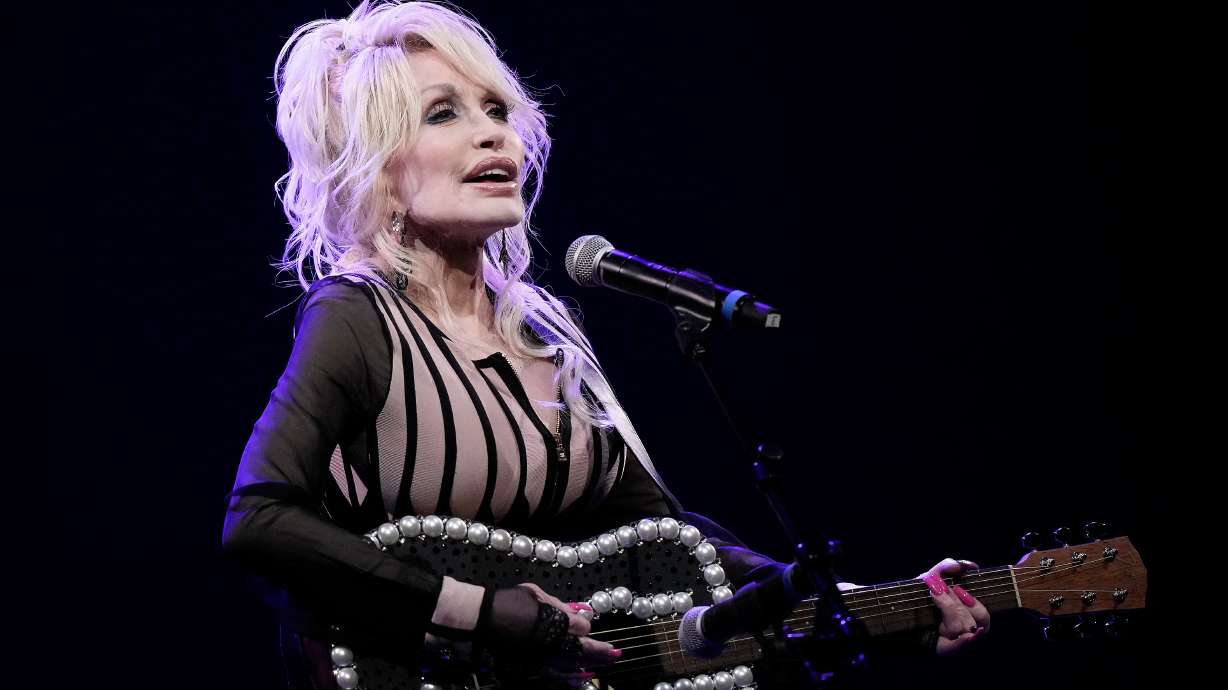 Dolly Parton performs in Overland Park, Kan., on Aug. 14, 2023. Parton’s Imagination Library is teaming up with Utah’s Operation Literacy to help improve state reading levels.