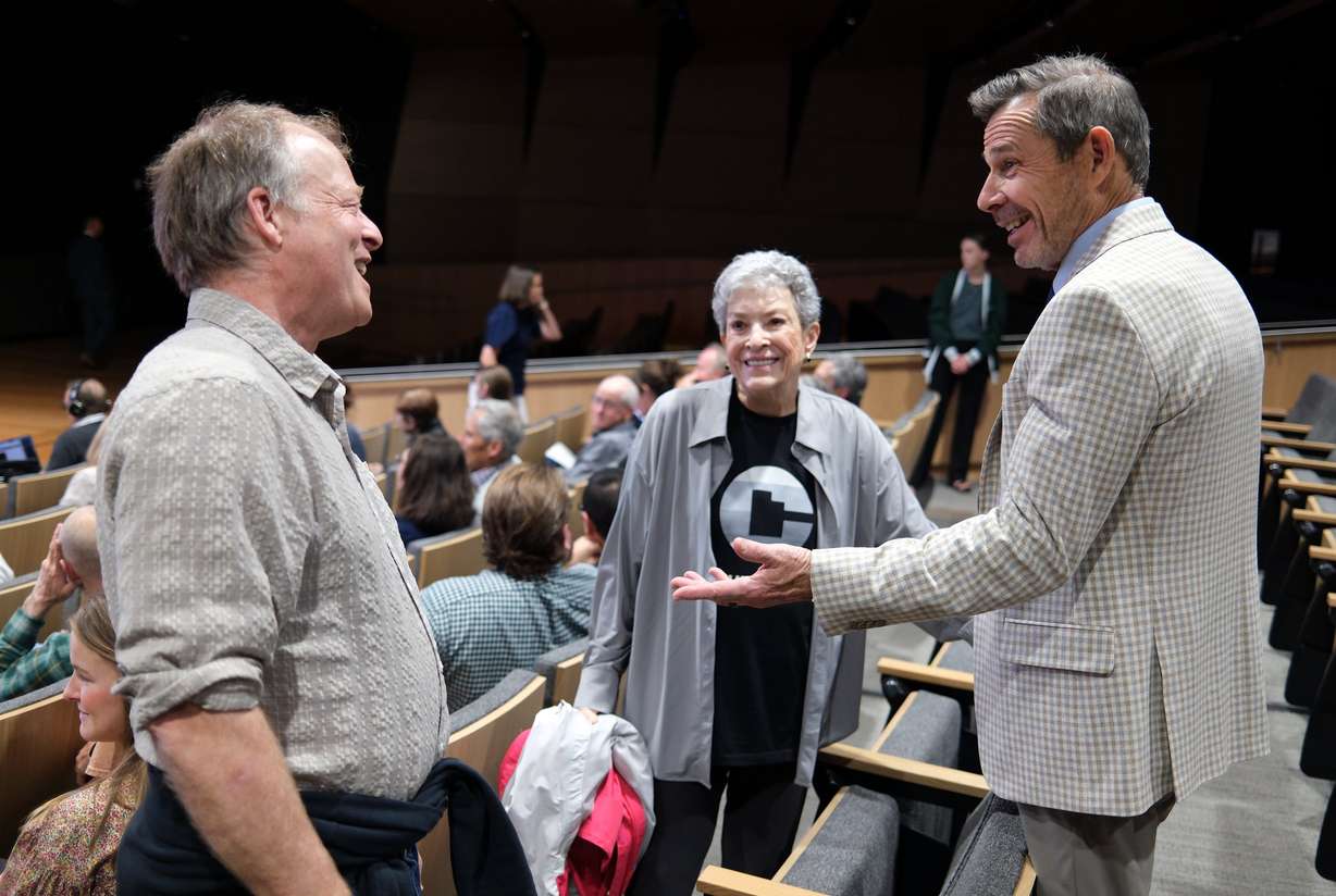 Tom Moyer and Andy Barros talk with Sen. John Curtis, R-Utah, at “An Evening with Senator John Curtis: Bringing People Together for Constructive Conversation about Climate Change,” at the Scott C. Keller Business Building at UVU in Orem on Monday.