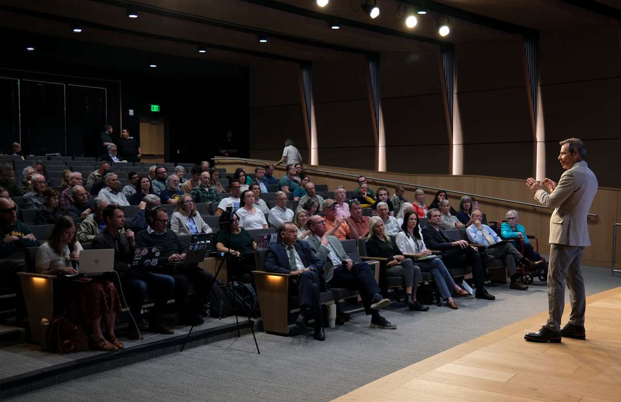 Sen. John Curtis, R-Utah, speaks at “An Evening with Senator John Curtis: Bringing People Together for Constructive Conversation about Climate Change,” at the Scott C. Keller Business Building at UVU in Orem on Monday.