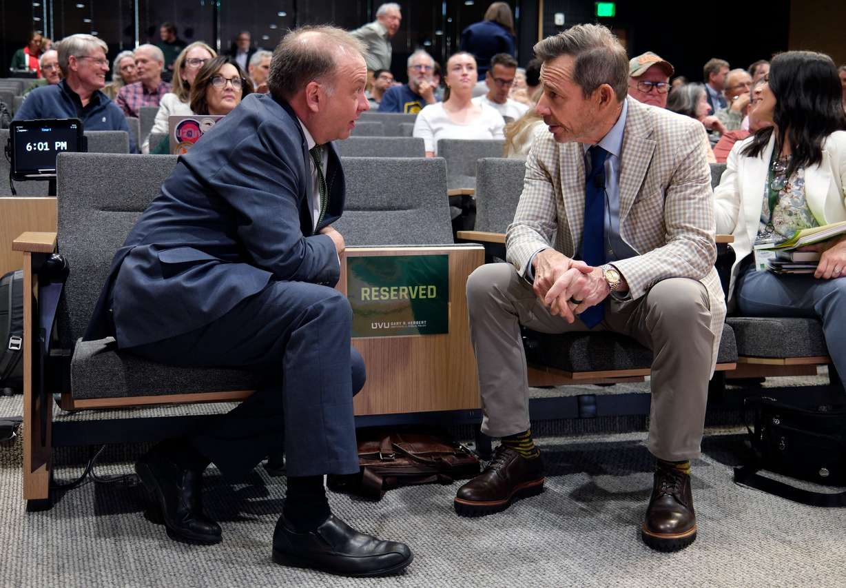 Utah Valley University acting President Wayne Vaught talks with Sen. John Curtis, R-Utah, at An Evening with Sen. John Curtis: Bringing People Together for Constructive Conversation about Climate Change, at the Scott C. Keller Business Building at UVU in Orem on Monday.