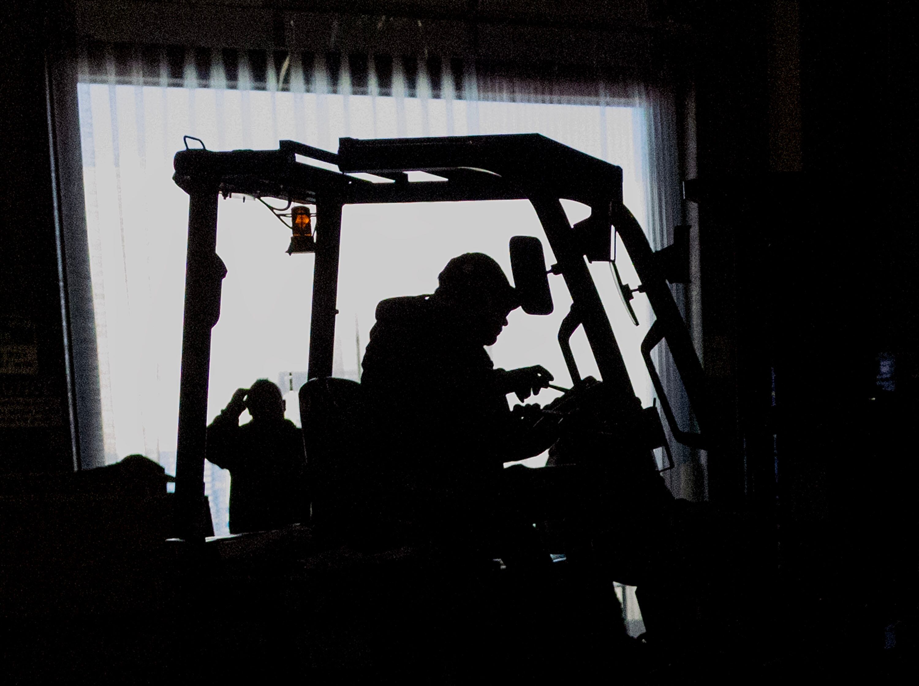 Boxes of food are loaded and unloaded at the Utah Food Bank in Salt Lake City on Wednesday.