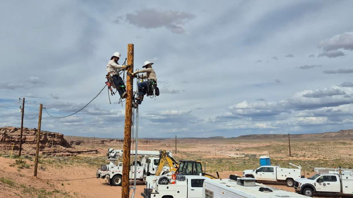 A Murray city power crew during electrification efforts as part of the Light Up Navajo initiative in April.